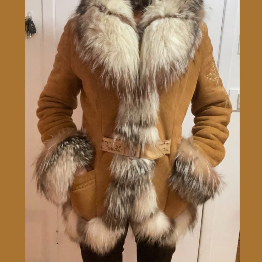 One-of-a-kind designer suede coat, adorned with genuine fur